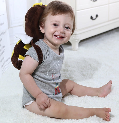 Babykudde med skydd för huvud – söt med små vingar